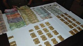 Chavakacheri woman arrested with 7 kg of gold and foreign money