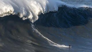 Giant wave slams into British surfer Andrew Cotton causing huge wipeout