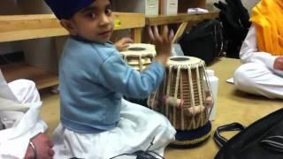 Cute Little Kid Doing Kirtan