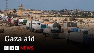 More aid lorries enter Gaza after US threat to cut Israel's military support | BBC News