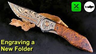 Triple-T #210:  Laser engraving a new damascus folding knife