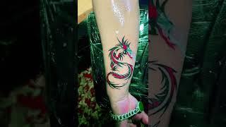 Dragon tattoo hand red clouring allen 3d tattoo house Nepal pokhara prashyang