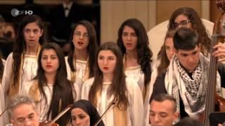 Chris de Burgh & The Yasmeen Choir sing " A Spaceman Came Travelling"