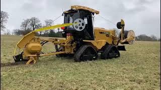 Vermeer RTX1250i2 quad track vibratory mole plough installing rural fibre.