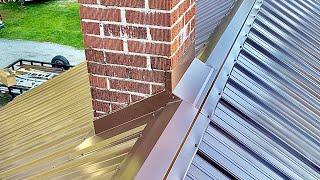 Chimney flashing on a metal roof.