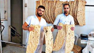 Baking 3000 original Iranian Sangak bread in the bakery: Sangak bread baking video