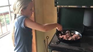 Cooking dinner on the Wood Cookstove