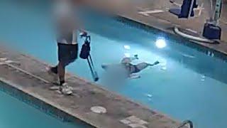 Las Vegas-area gym video surveillance shows swimmers exercising feet away as woman struggles, drowns