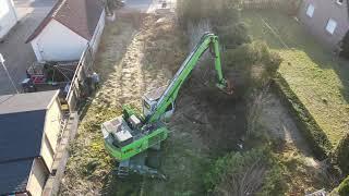 Forstwirtschaftsmaschine Sennebogen 718E reißt Hecke raus