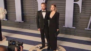 Aaron Paul and Lauren Paul on the Red Carpet for the 2018 Vanity Fair Oscar Party in Los Angeles