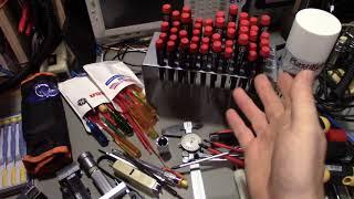 Hand tools, widgets and gizmos used in electronics repair.