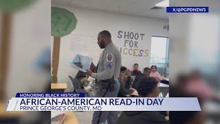 Prince George's County Corporal reads to students for National African-American Read-In Day