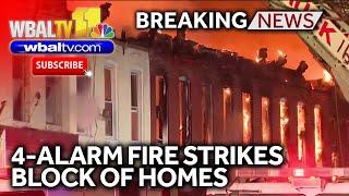 Firefighters battle massive 4-alarm rowhome fire in North Baltimore