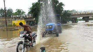 Sonalika 60 Rx Tractor washing in river using motorcycle