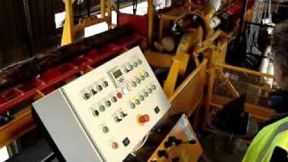 The Cundey Automatic Debarking System
