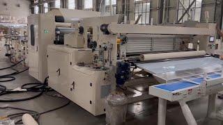 Automatic toilet tissue paper roll making machine