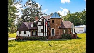 Rare Tudor style home for sale in Glen Allen Virginia on 3.11 Acres. Asking $399k