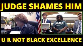 Judge Boyd scolds' man who thinks his T-shirt says black excellence. She said you are not black e...