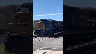 Heavy Weight Flat Car Trails Behind SD70MAC Leader