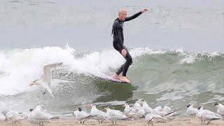 Long boarding a crazy but fun shorebreak