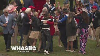 Trainer Eric Reed celebrates after long-shot Rich Strike's upset Kentucky Derby win