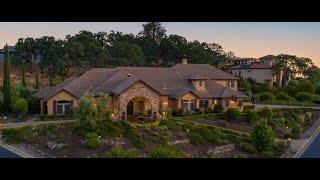 Breathtaking views of Folsom Lake, the Sierras & city lights from this incredible 1 acre estate!