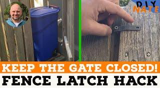 Fence Latch Hack - How to Keep a Fence Gate Shut Using a Flexible Coax Cable Clip! - by DIYNate