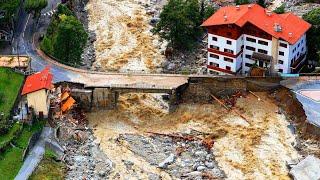 Streams of water and mud have washed an island in Spain into the sea