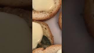 Crunchy toasted cheese with fresh thyme 