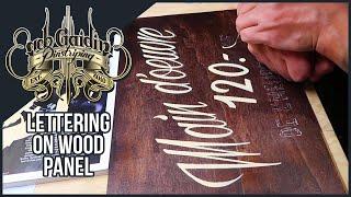 Lettering and pinstriping on cut out wood panel - Black Way Motorcycle