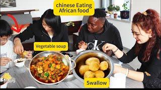 Chinese Eating Nigerian Food for the  time