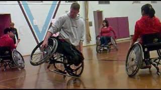 Patrick Anderson playing with his wheelchair