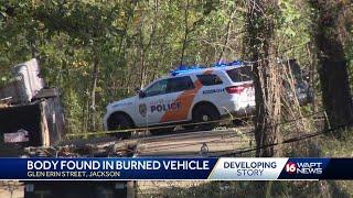 JPD investigating body found in burned vehicle