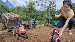 The excavator repairs the path of logging to the mountains brought by Typhoon Yagi.