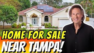 Home for Sale Near Tampa Florida—Fully Renovated with Pool & Tropical Backyard