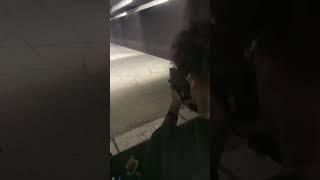 Burst firing p90 at shooting range
