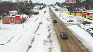 02-16-2021 Texarkana, TX - Drone Footage Reveals Sharp Difference in Snow Removal Between TX & AR