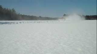 Honda TRX 420 On A Frozen Lake