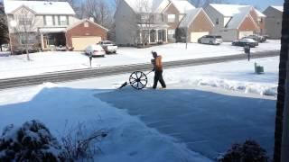 Snow Shovel With a Wheel