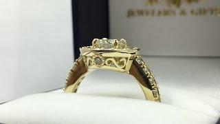 Custom designed, hand made, yellow gold and diamond halo ring.