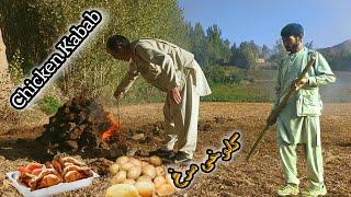 Cooking simple chicken and potatoes In the style of 2000 years ago