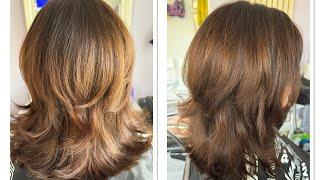 Learn how to cut a long graduation and blowdry hair with volume NVQ level 2