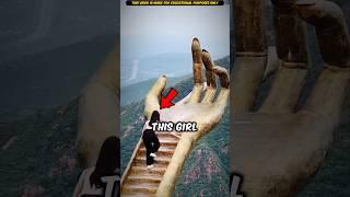 Fearless Girl Climbs Giant Buddha’s Hand in China | #viral #shorts