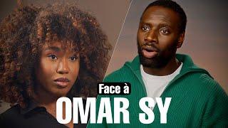 Face à OMAR SY.