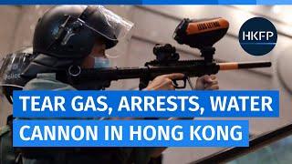 Hong Kong police crack down on protesters with mass arrests, tear gas, water cannon, pepperballs