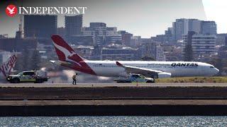 Qantas emergency landing sparks grassfire at Sydney airport after engine failure