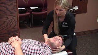 Spinal Adjustment: Back Pain Treatment at West End Chiropractic (Female Doctor, Male Patient)