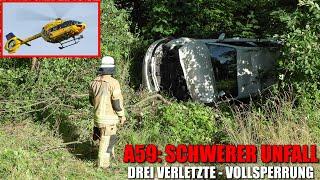 [SCHWERER UNFALL IN A59-AUSFAHRT!] - PKW kam von Fahrbahn ab & landete auf Seite - 3 Verletzte - RTH