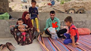 Rural family .Babak received a gift package from the post office for Arman and the children