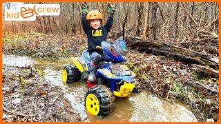 Playing in the mud on ATV and making trail in woods, building bridge. Educational | Kid Crew